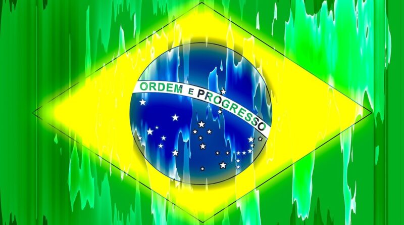 Bandeira do Brasil estilizada como uma pintura em aquarela com os traços escorrendo sobre a tela.